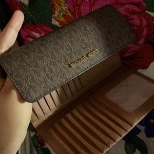 Micheal Kors wallet. Never used